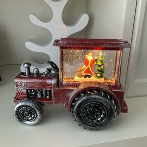 Christmas Snowglobe Santa in a Tractor with Lights and Swirling Glitter Battery